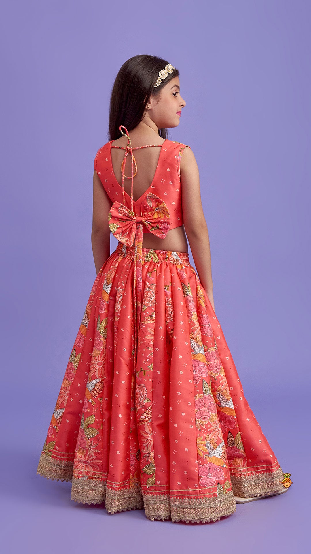 Pre Order: V Neck Peach Top And Printed Lehenga With Hair Band