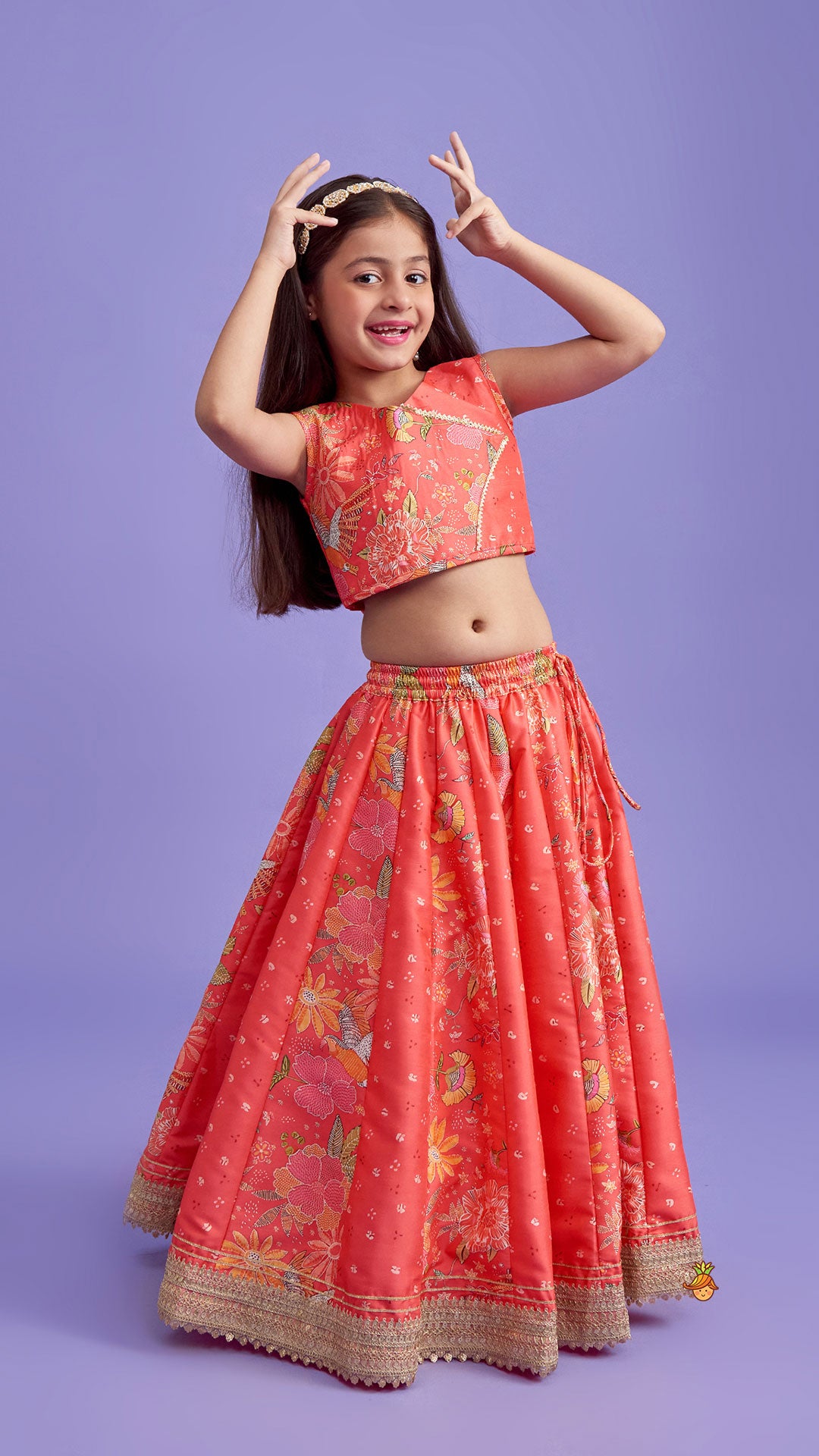 Pre Order: V Neck Peach Top And Printed Lehenga With Hair Band