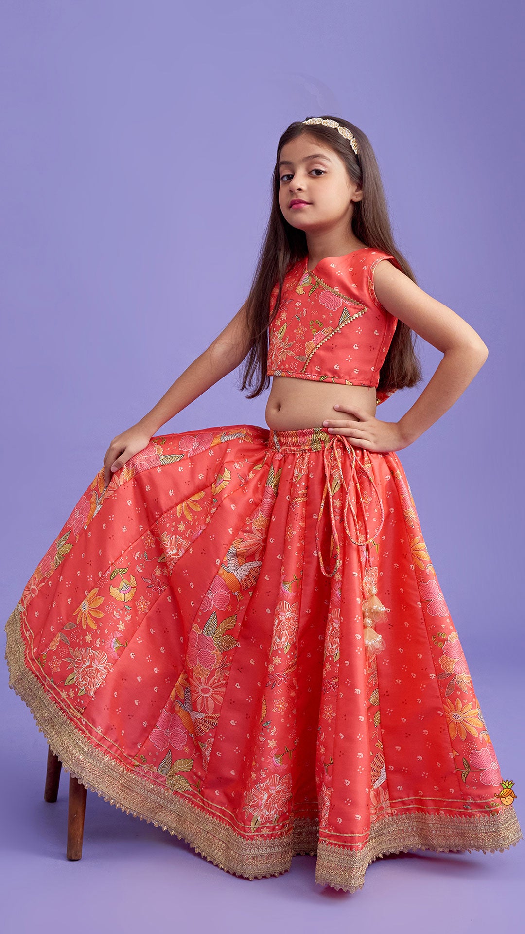 Pre Order: V Neck Peach Top And Printed Lehenga With Hair Band