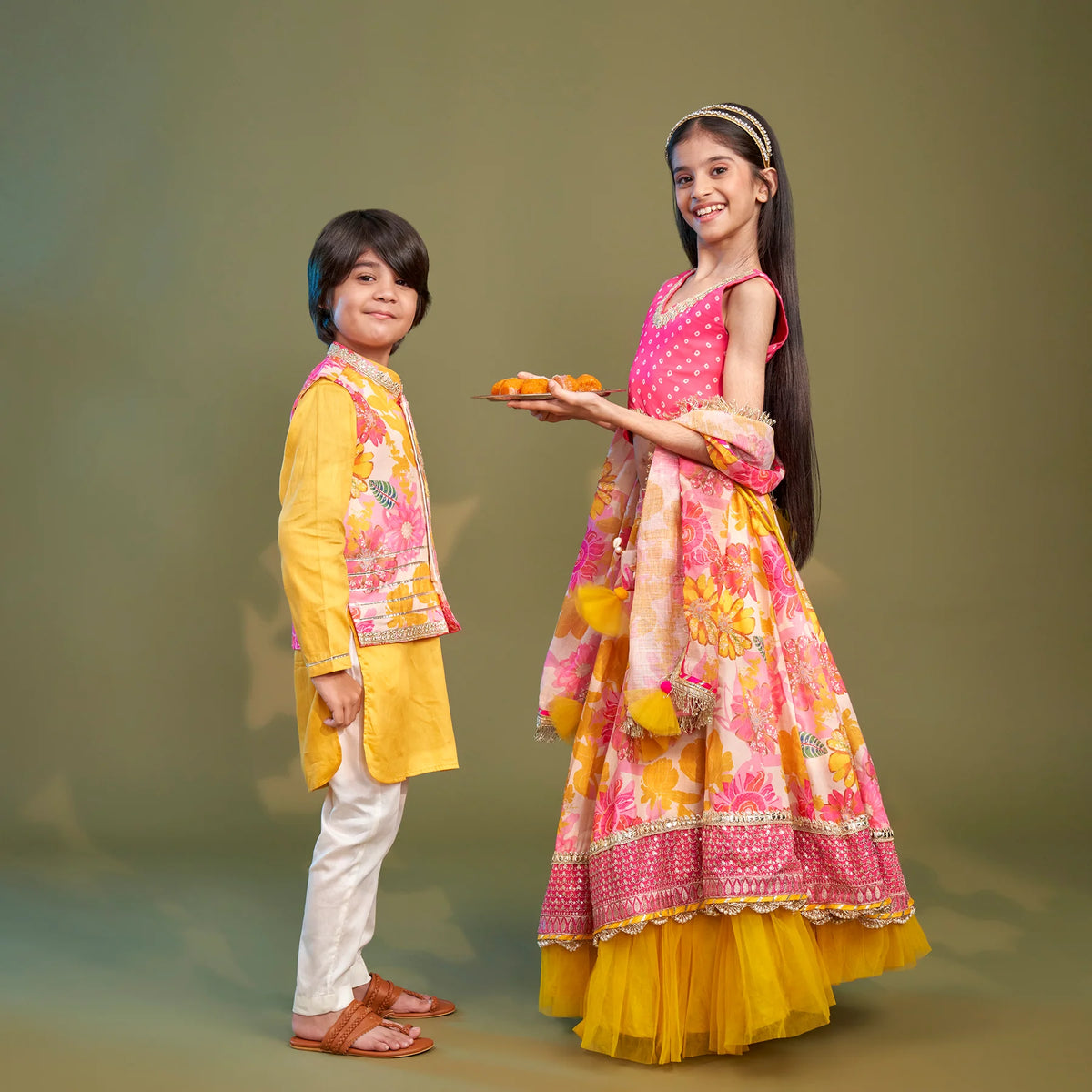 Bandhani Printed Top And Floral Printed Layered Lehenga With Matching Dupatta twinning model image 1