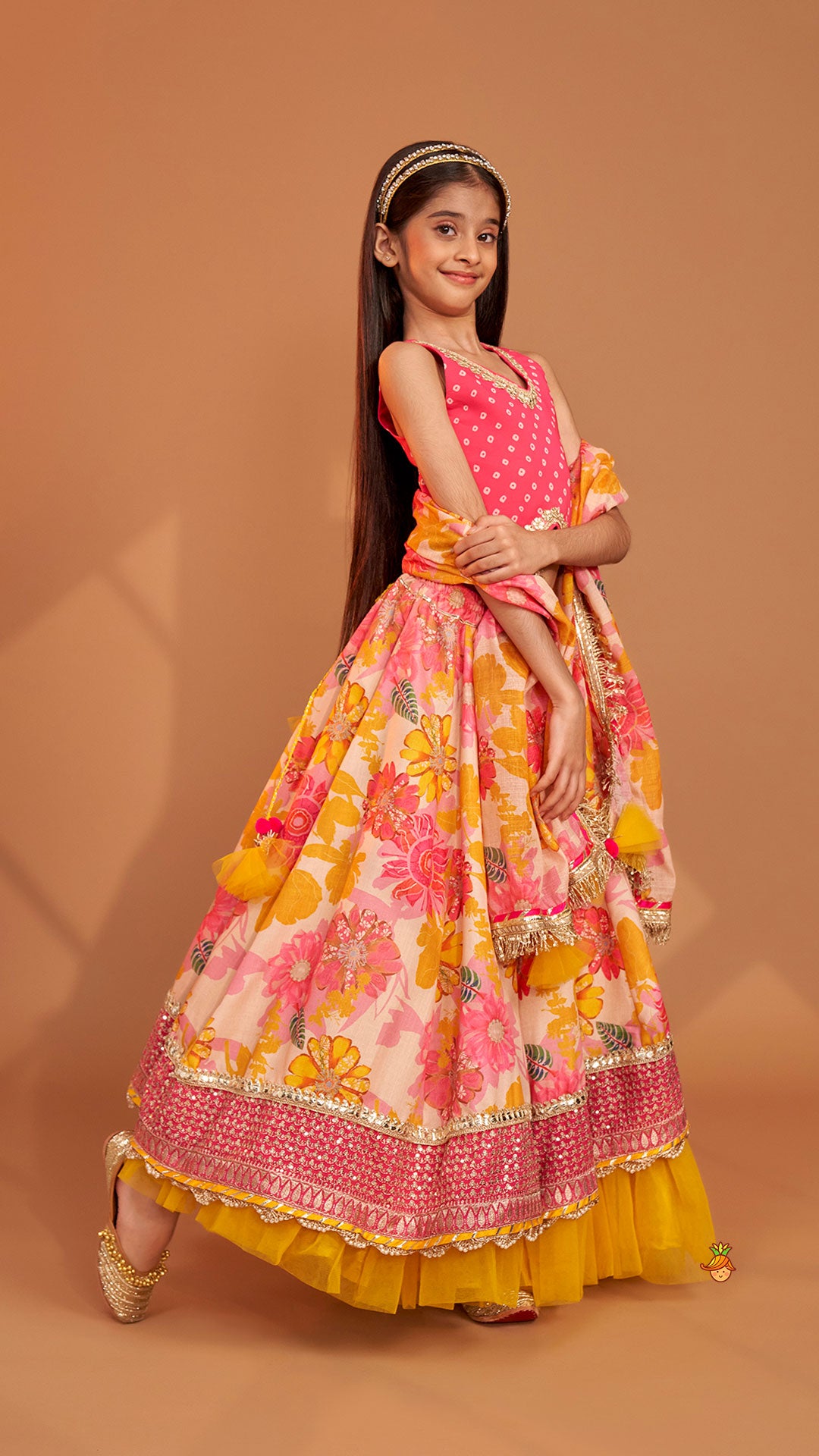 Pre Order: Bandhani Printed Top And Floral Printed Layered Lehenga With Matching Dupatta