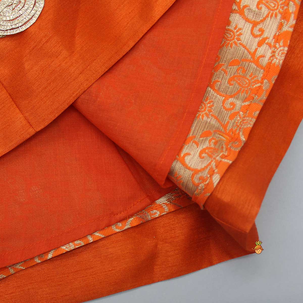 Pre Order: Orange Brocade Anarkali With Detachable Belt And Net Dupatta