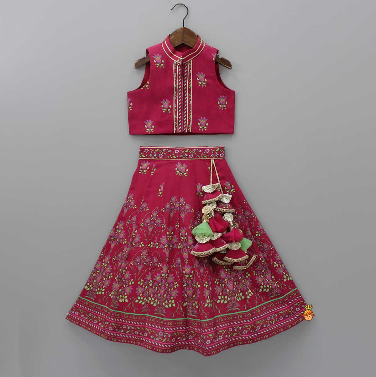 Pre Order: Floral Printed Top And Lehenga With Matching Potli And Net Dupatta