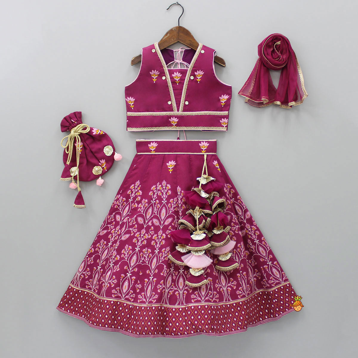 Pre Order: Magenta Printed Top And Lehenga With Matching Net Dupatta And Potli Bag