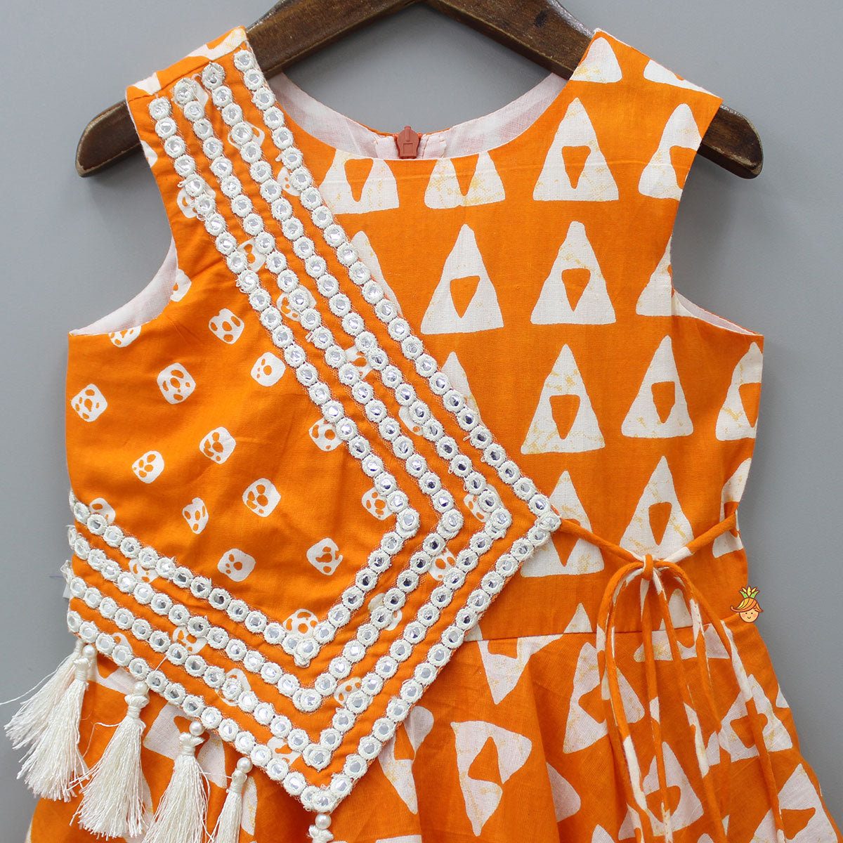 Pre Order: Orange Printed Kurti With Faux Mirror Work Flap
