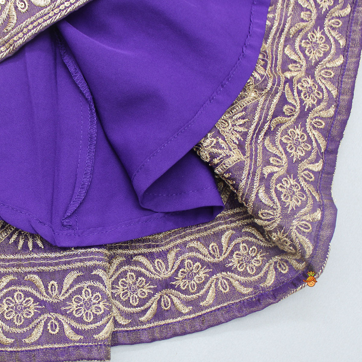 Embroidered Purple Top And Pleated Lehenga With Net Dupatta