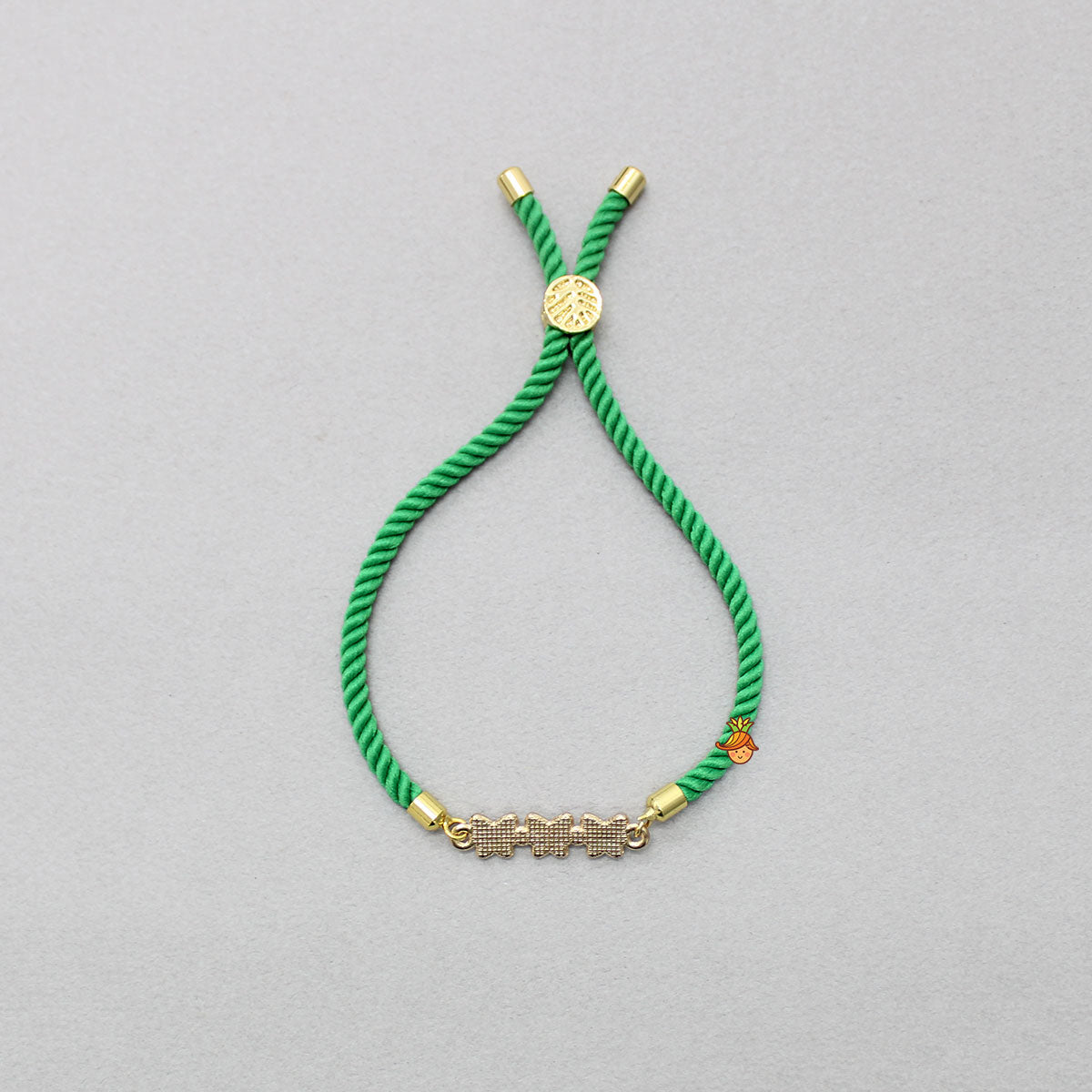 Green Adjustable Rope String Rakhi With Fancy Embelisment