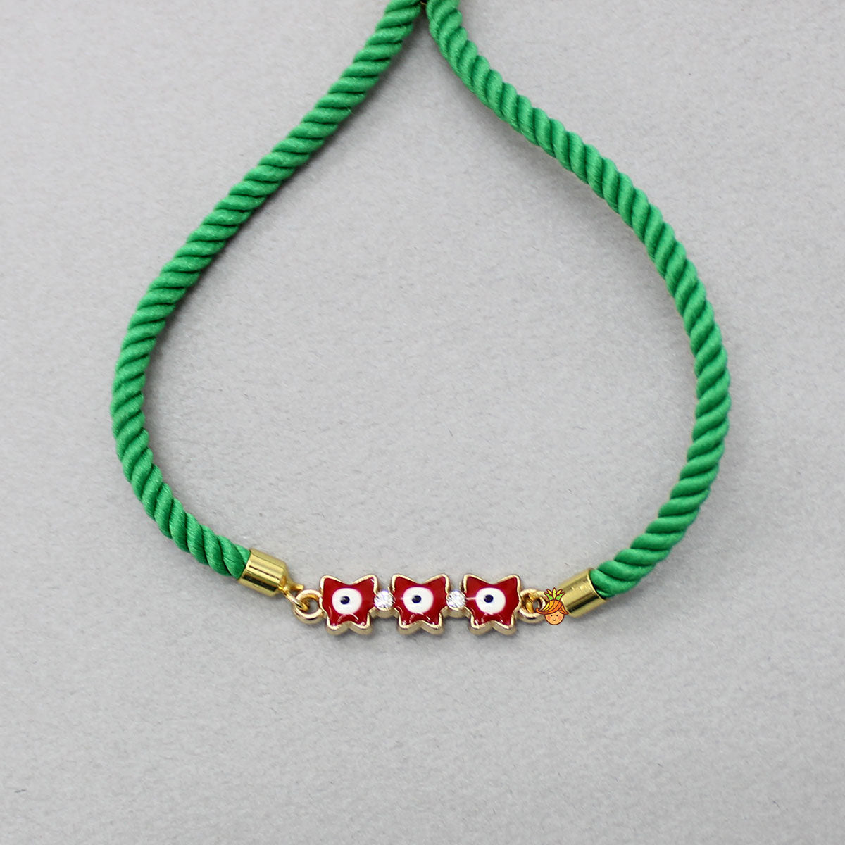 Green Adjustable Rope String Rakhi With Fancy Embelisment