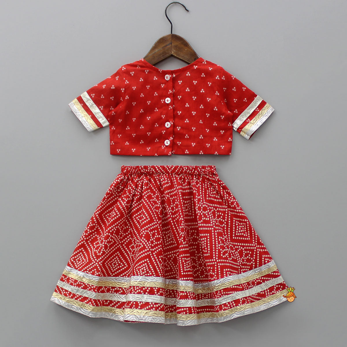 Pre Order: Bandhani Printed Red Top With Lehenga And Matching Booties With Head Band