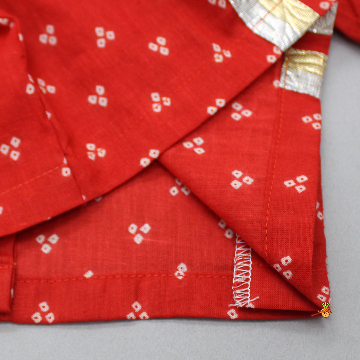 Pre Order: Bandhani Printed Red Top With Lehenga And Matching Booties With Head Band