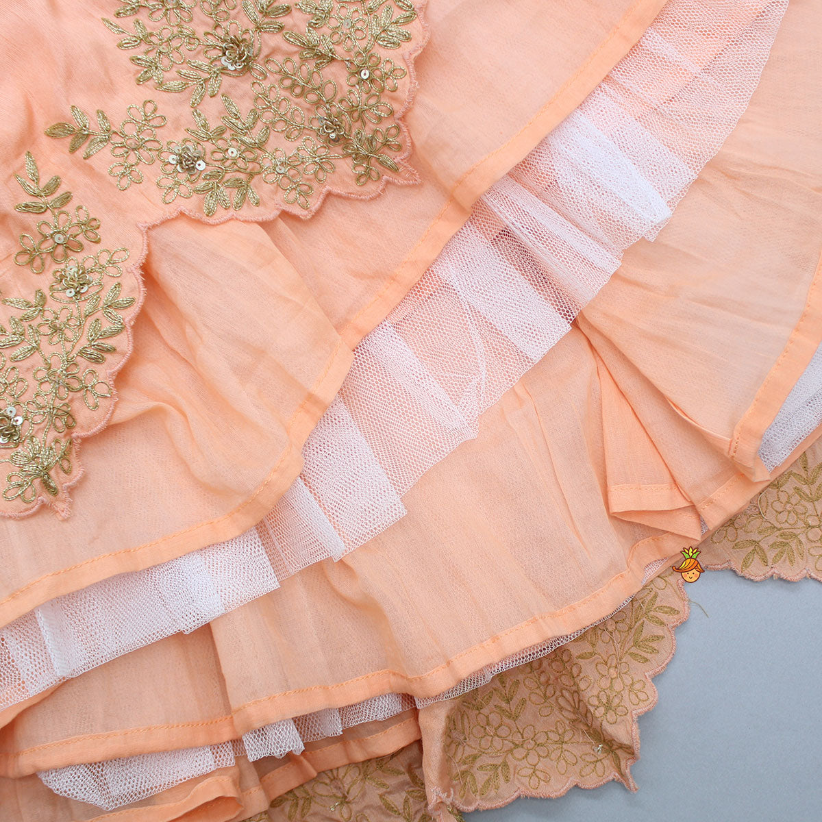 Pre Order: Embroidered Peach Tie-Up Strap Top And Pleated Lehenga