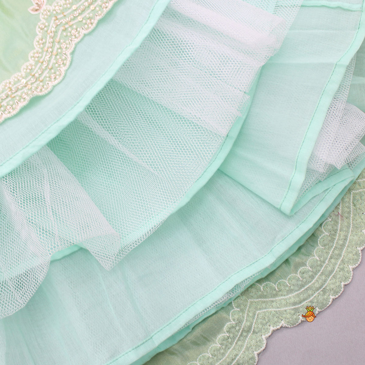 Pre Order: Embroidered Green Top And Pleated Lehenga