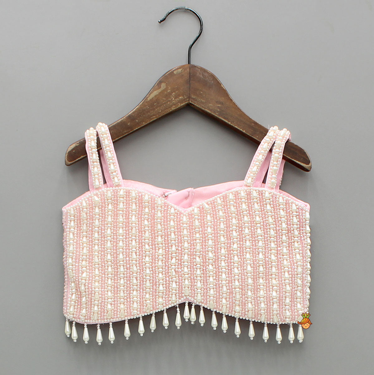 Pre Order: Pink Stylish Strappy Top And Ruffle Net Lehenga