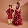 Chanderi Embroidered Maroon Peplum Top With Lehenga twinning model image 1
