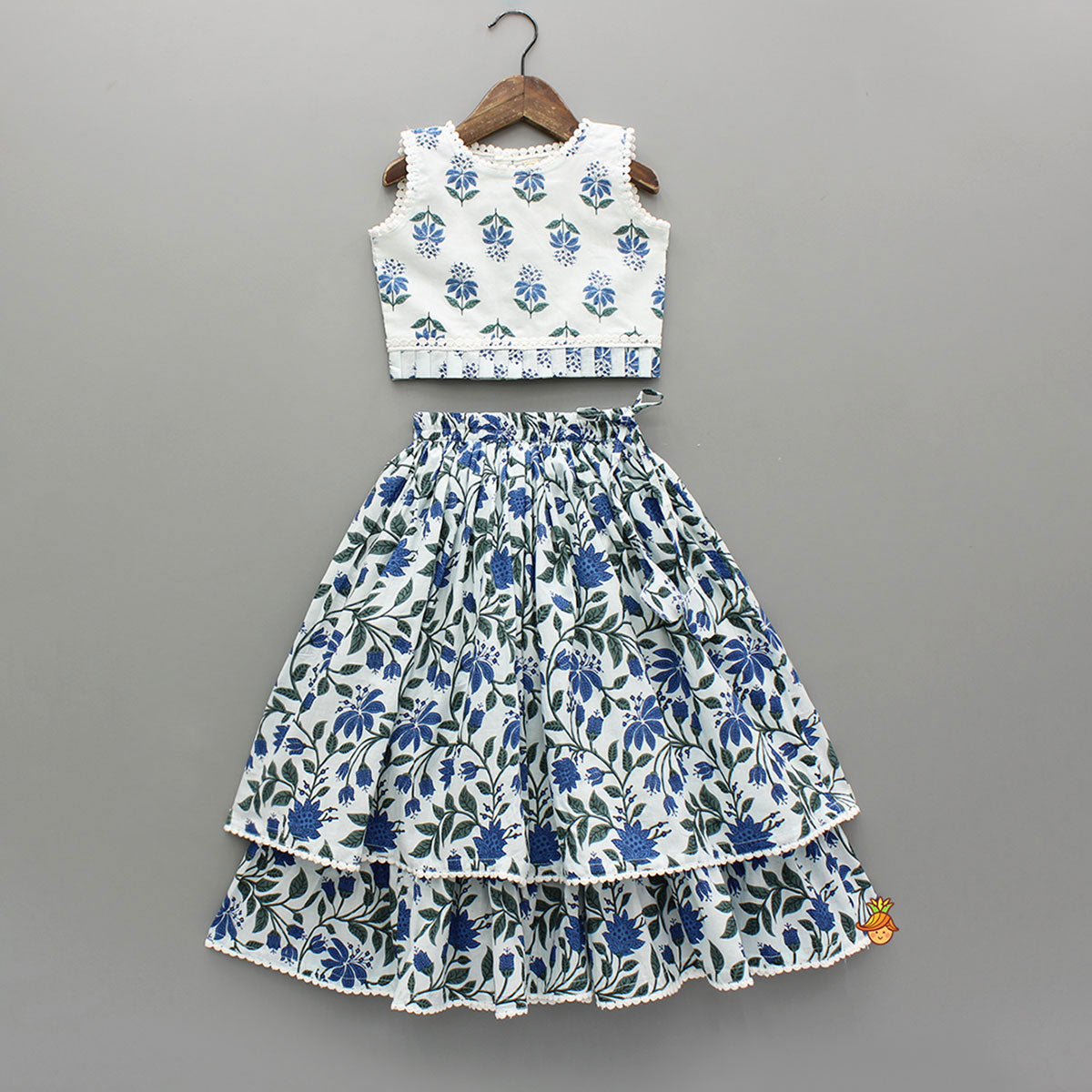 Pre Order: Floral Printed Top And Layered Lehenga