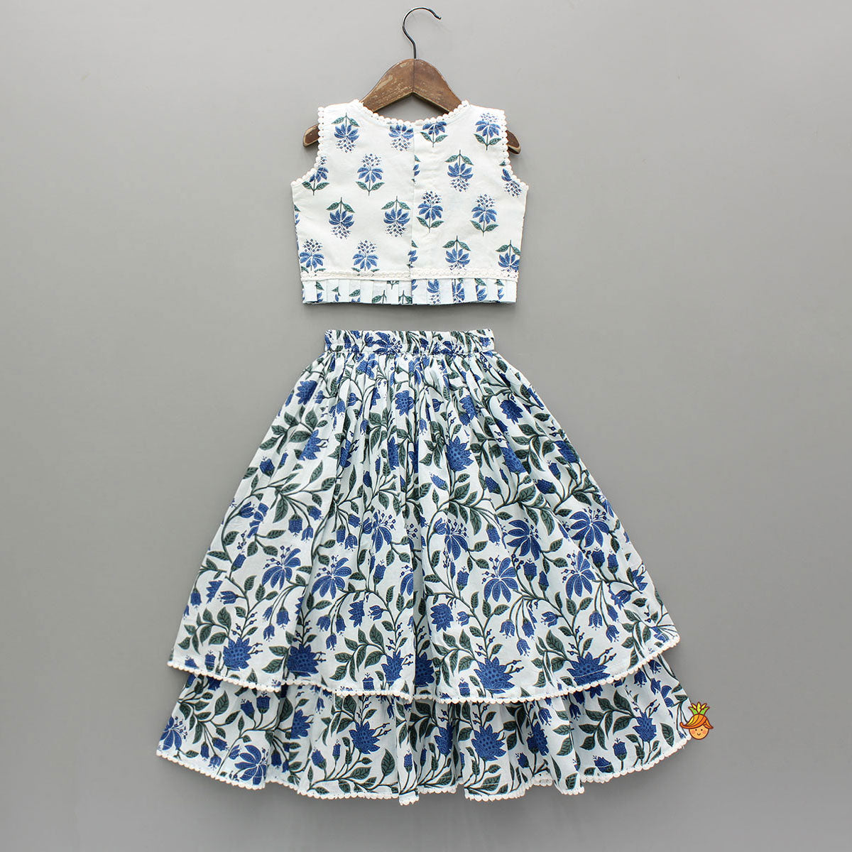 Pre Order: Floral Printed Top And Layered Lehenga