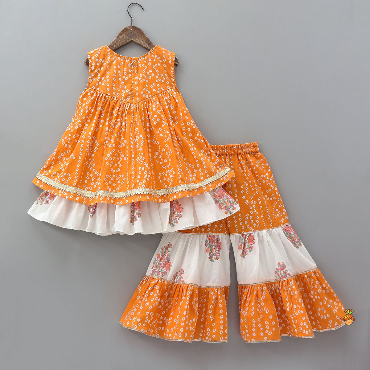 Pre Order: Bandhani Floral Printed Layered Kurti With Tiered Style Sharara And Dupatta