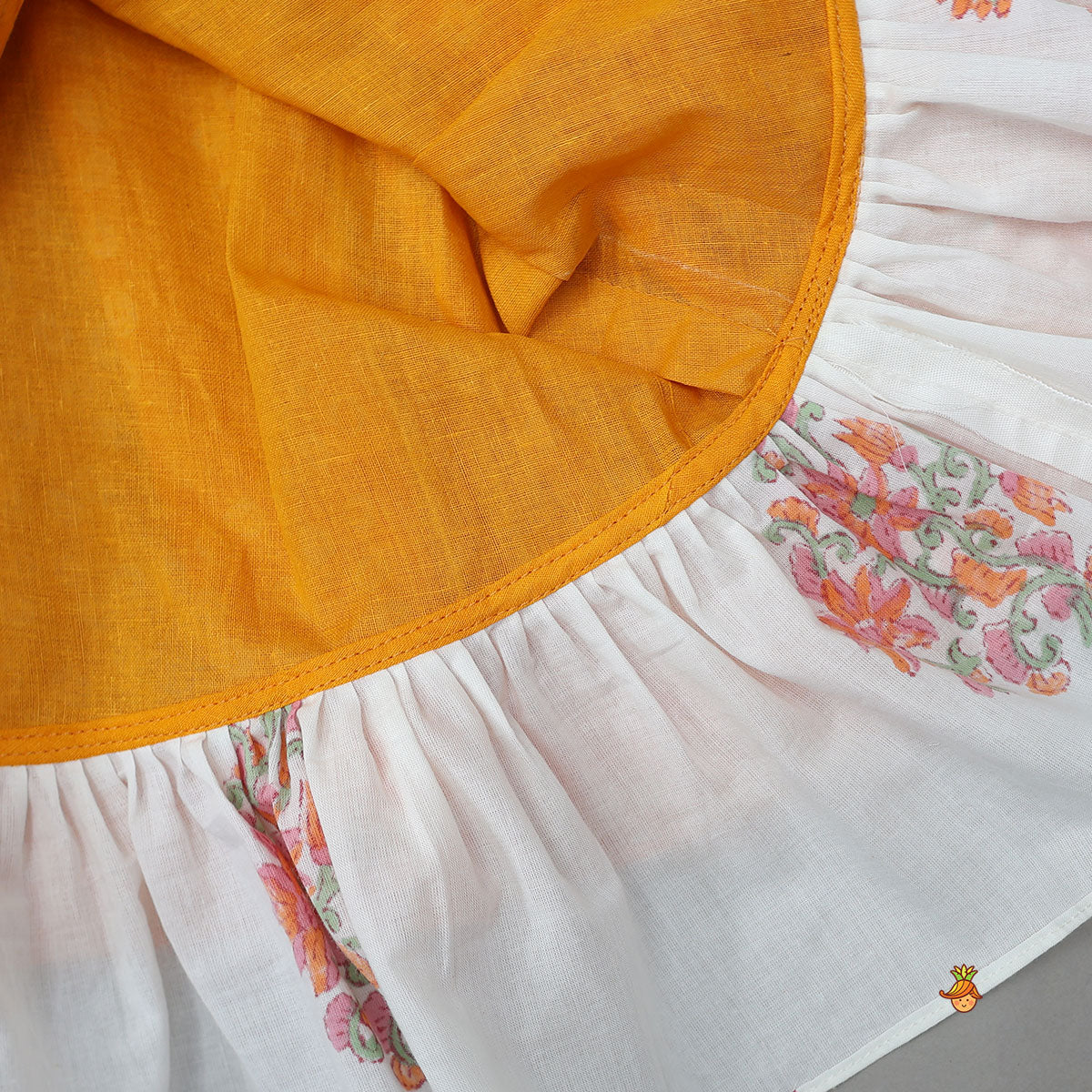Pre Order: Bandhani Floral Printed Layered Kurti With Tiered Style Sharara And Dupatta