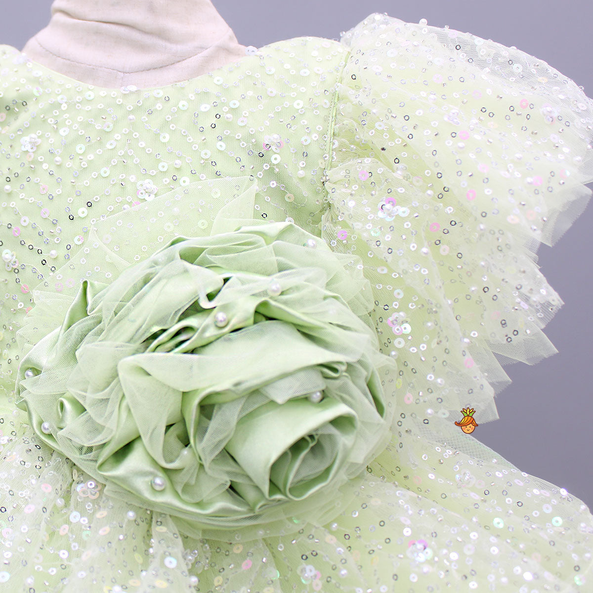 Pre Order: Green Sequin Embellished Dress Featuring Detachable Trail And Bow Paired With Swirled Bow Hairclip