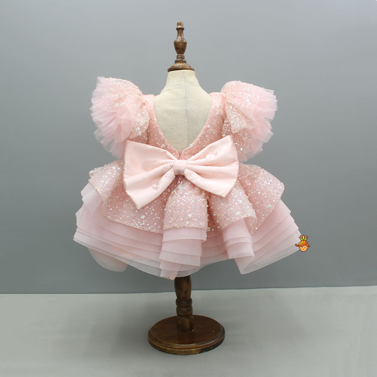 Pre Order: Peach Sequin Embellished Dress Featuring A Detachable Trail And Bow With Swirled Bow Headband