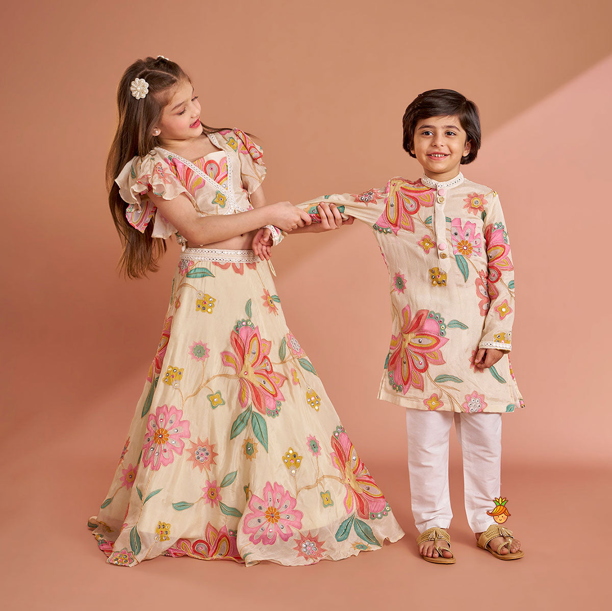 Multicolour Floral Printed And Embroidered Ivory Top With Matching Lehenga And Dupatta twinning model image 2