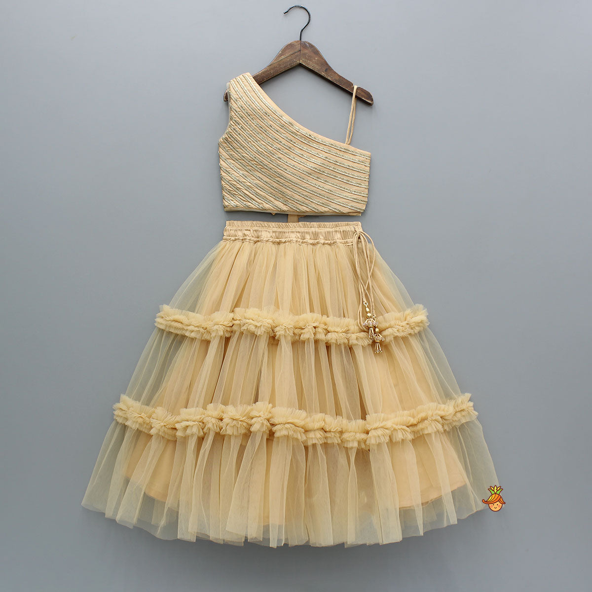 Pre Order: Beige Lace Work One Shoulder Top And Ruffle Lehenga
