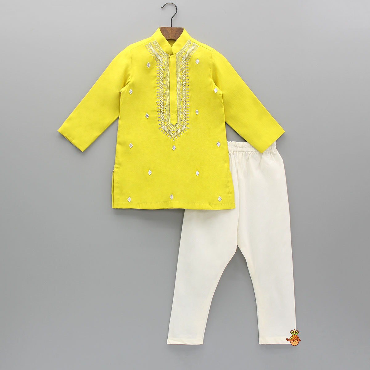 Pre Order: Yellow Embroidered Kurta And Churidar