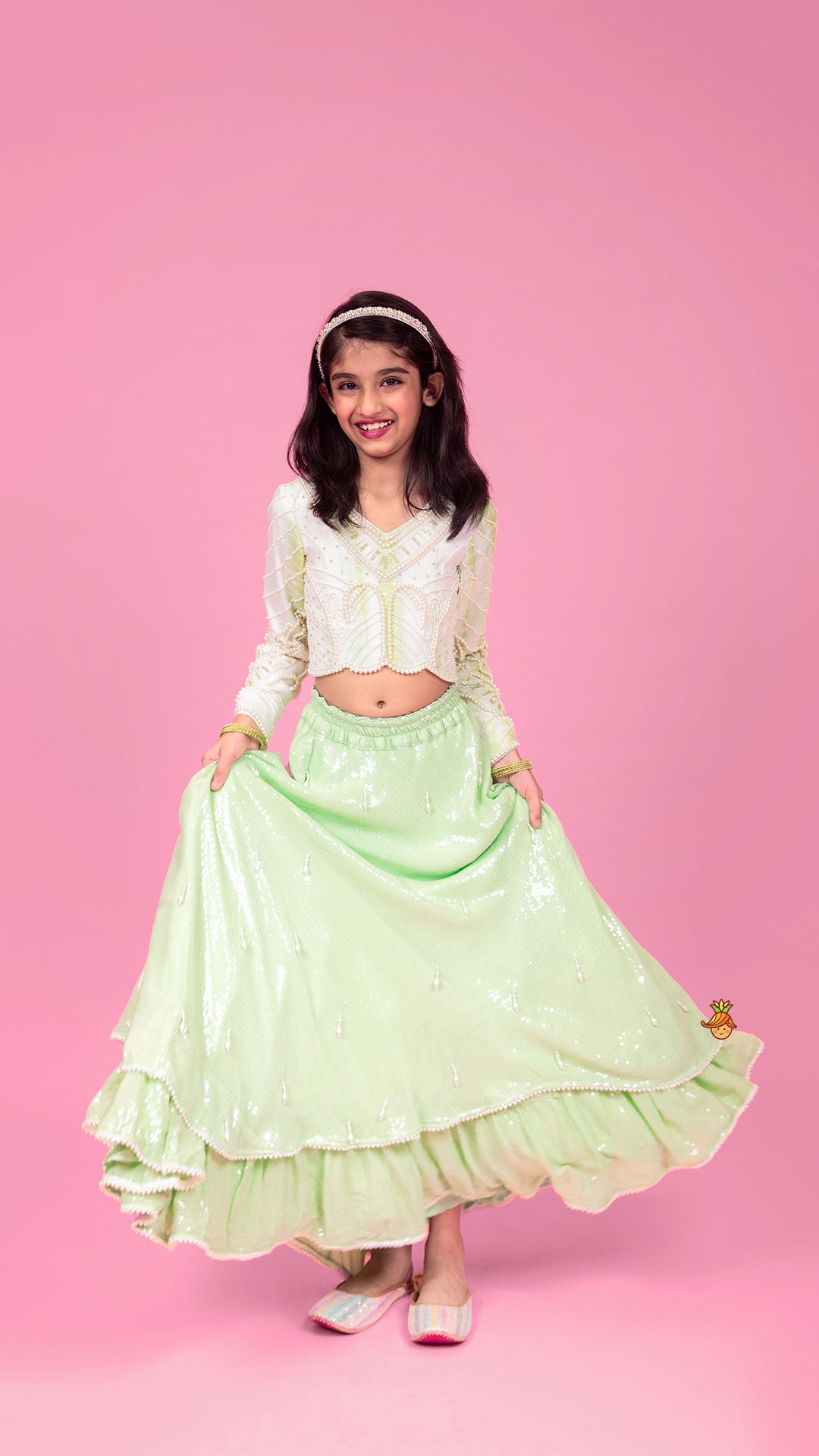 Pre Order: Dual Tone Embellished Embroidered Top And Green Lehenga With Matching Potli Bag