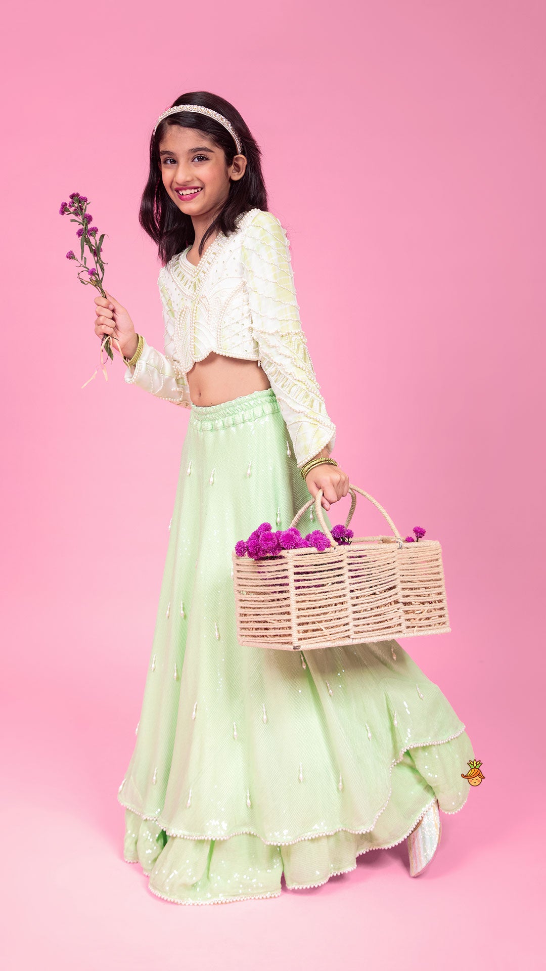 Pre Order: Dual Tone Embellished Embroidered Top And Green Lehenga With Matching Potli Bag