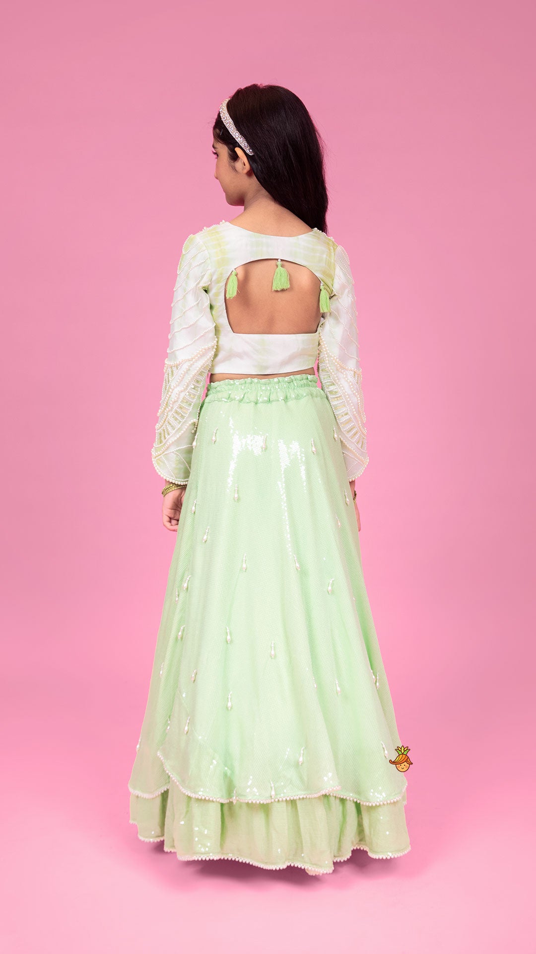 Pre Order: Dual Tone Embellished Embroidered Top And Green Lehenga With Matching Potli Bag