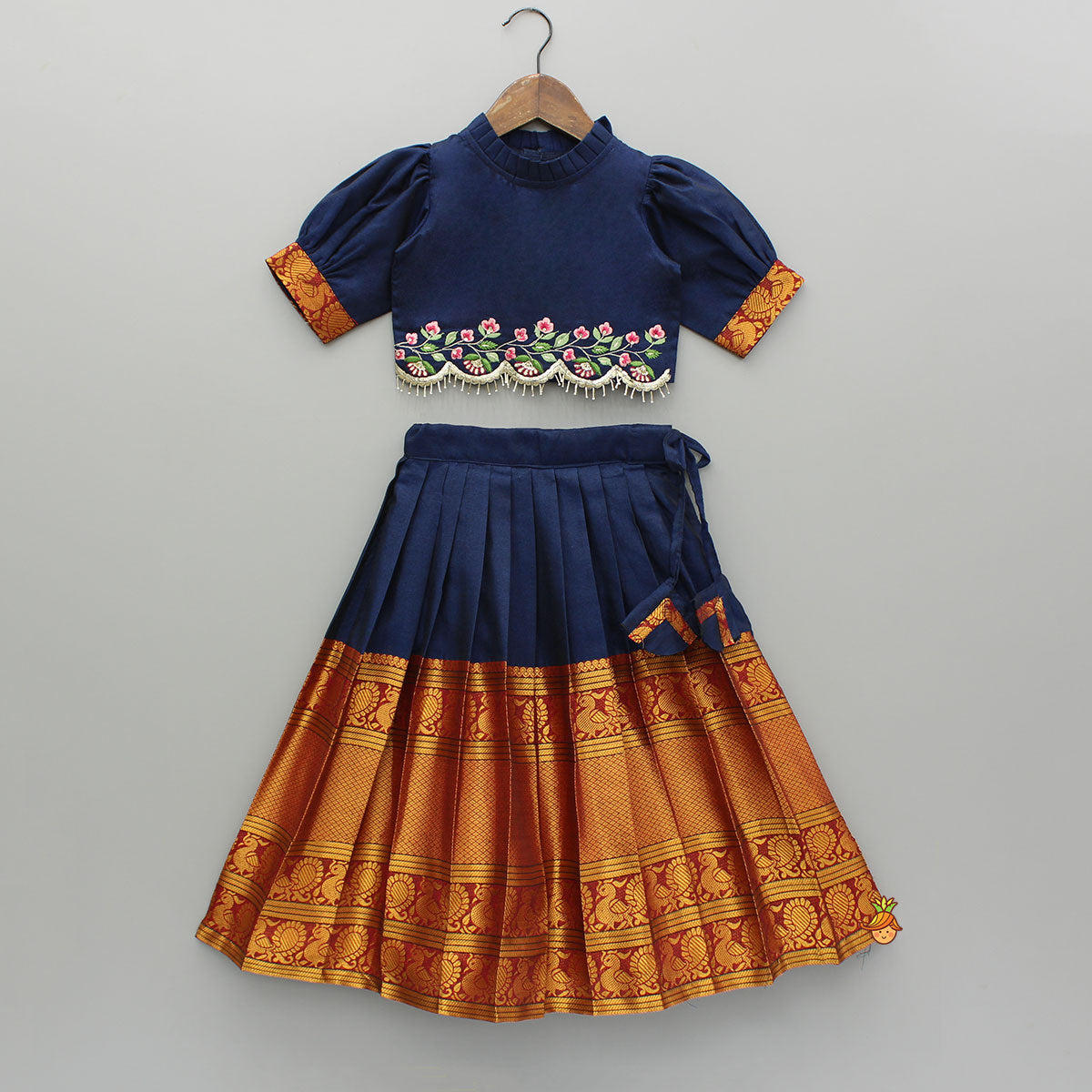 Pre Order: Blue Floral Embroidered Top And Pleated Lehenga