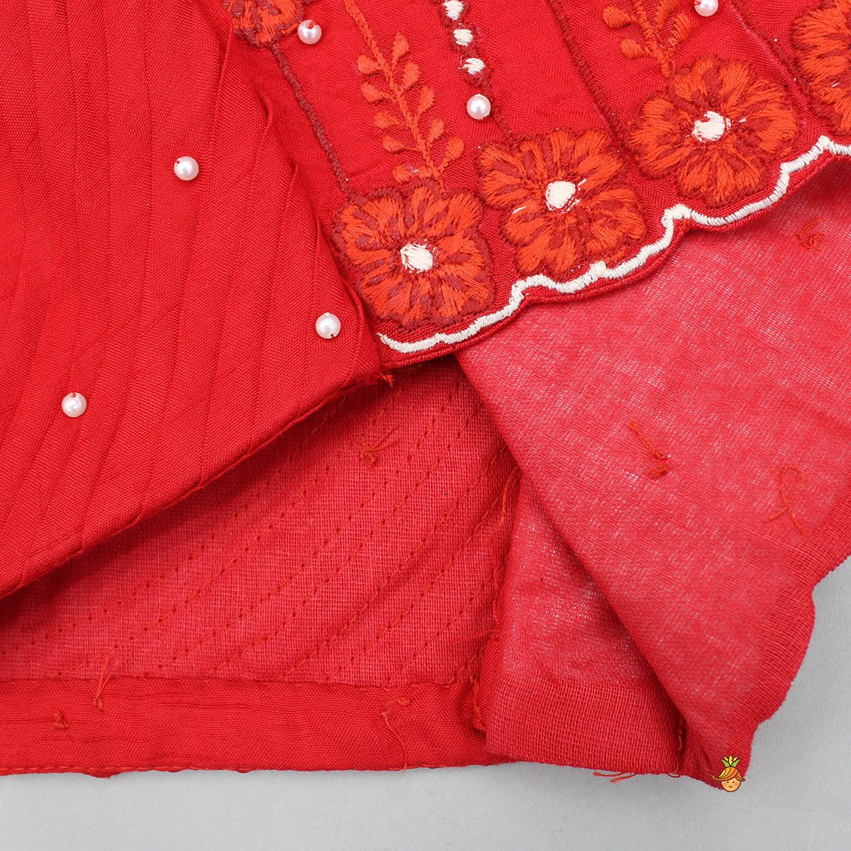 Pre Order: Red Embroidered Top And Cutwork Embroidered Lehenga