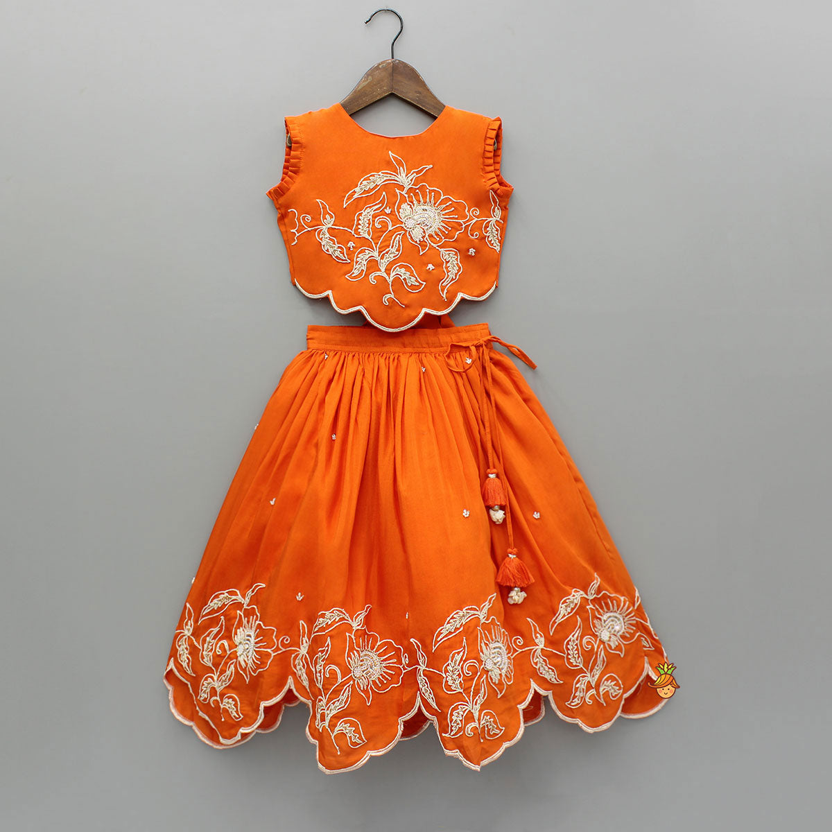 Pre Order: Orange Embroidered Dual Back Knot Detailed  Top And Lehenga With Scalloped Hem Detailing