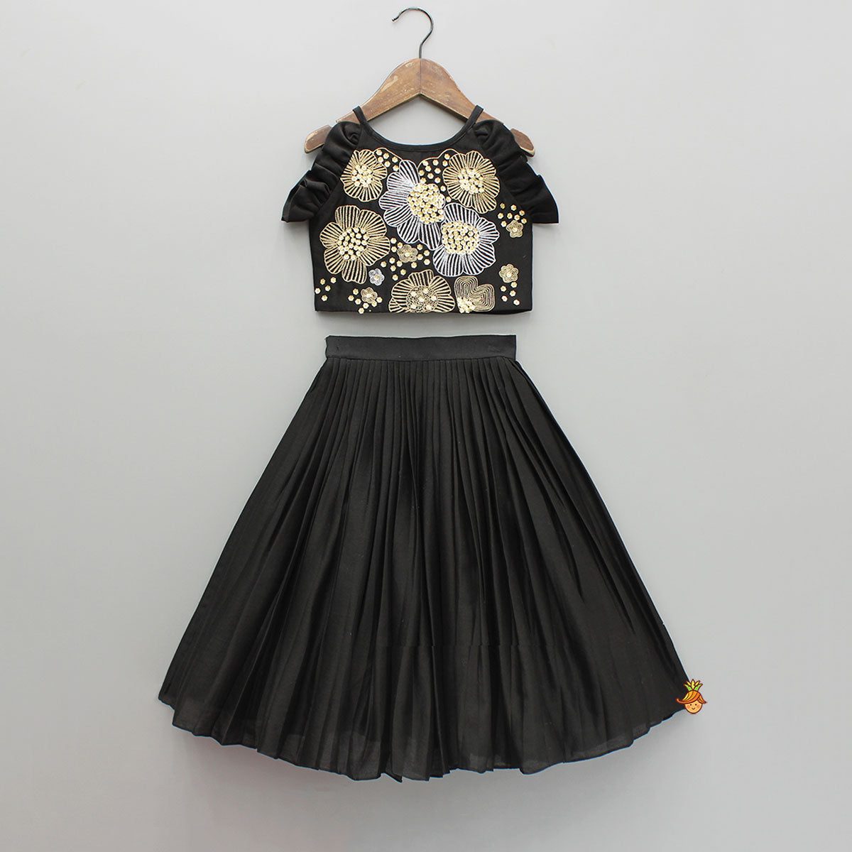 Pre Order: Black Embroidered Sleeveless Frill Top And Pleated Lehenga