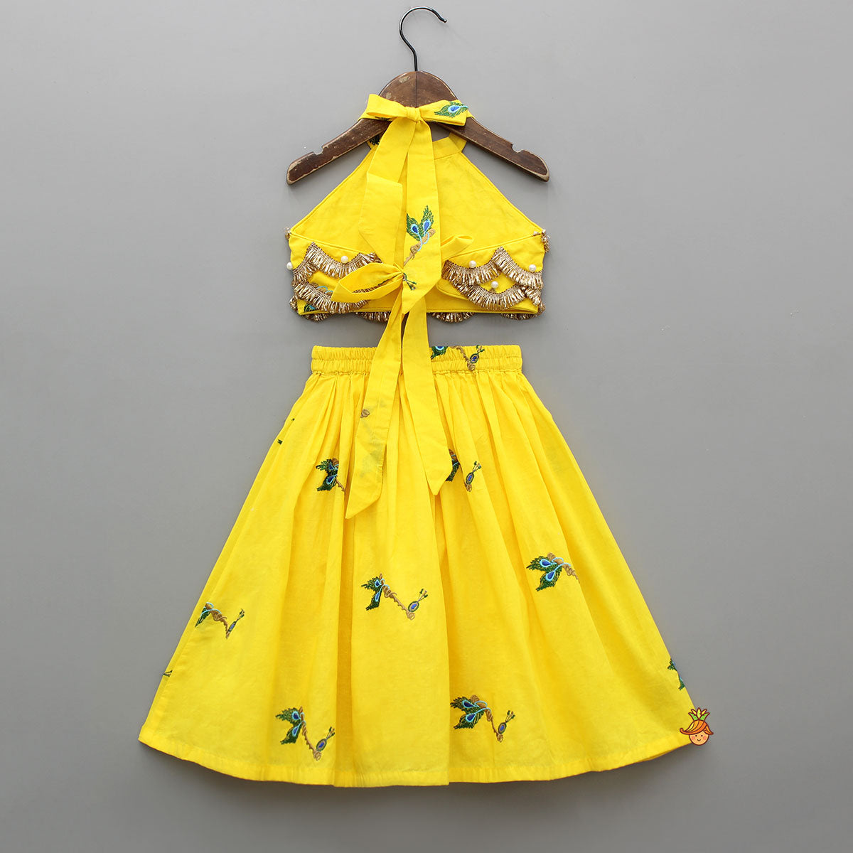 Pre Order: Yellow Embroidered Embellished Halter Neck Top And Lehenga With Head Band