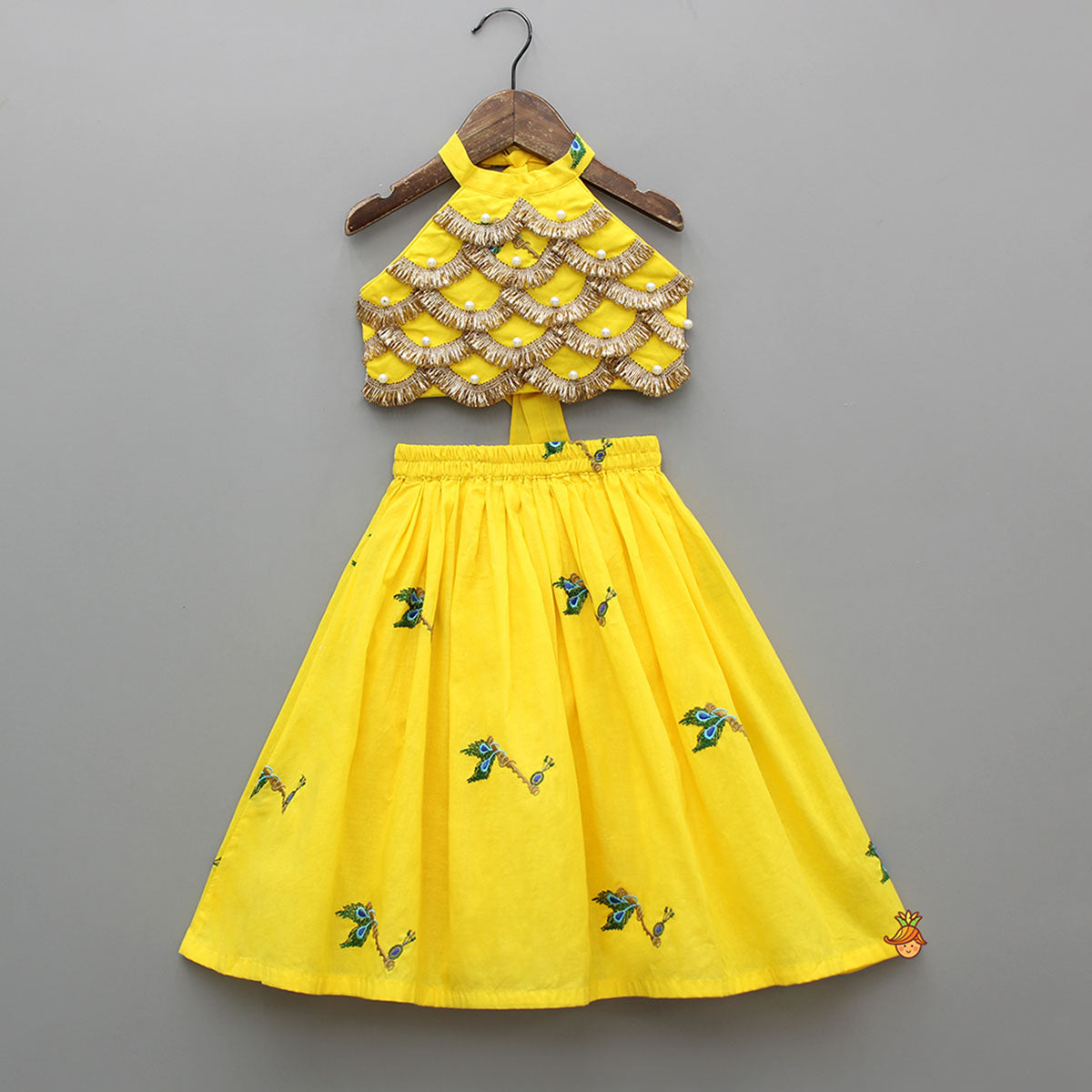 Pre Order: Yellow Embroidered Embellished Halter Neck Top And Lehenga With Head Band