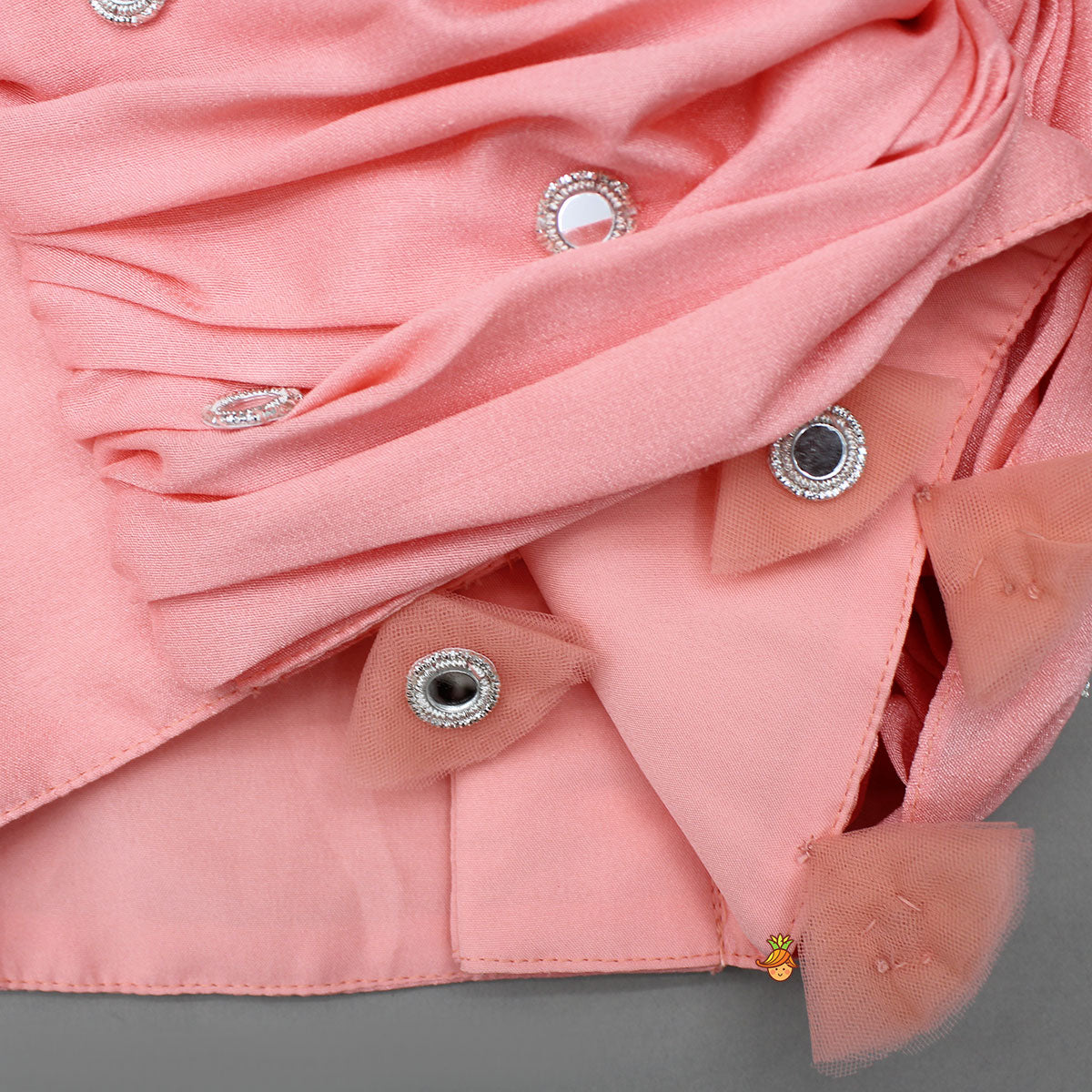 Pre Order: Peach Draped Knot Mirror Detailed Top With Embroidered Flared Lehenga And Dupatta