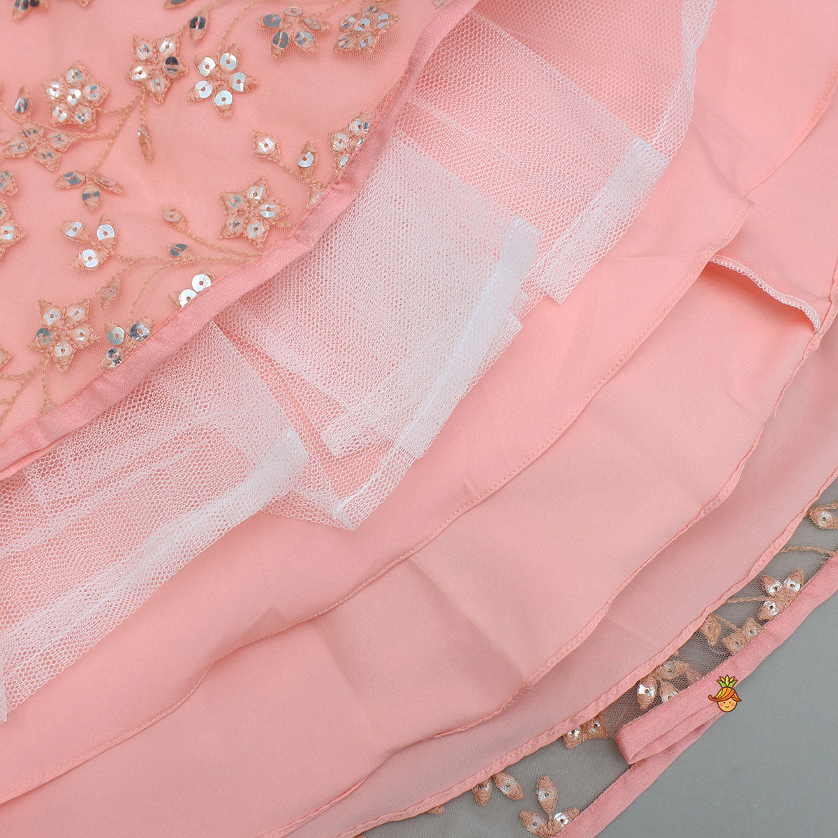 Pre Order: Peach Draped Knot Mirror Detailed Top With Embroidered Flared Lehenga And Dupatta