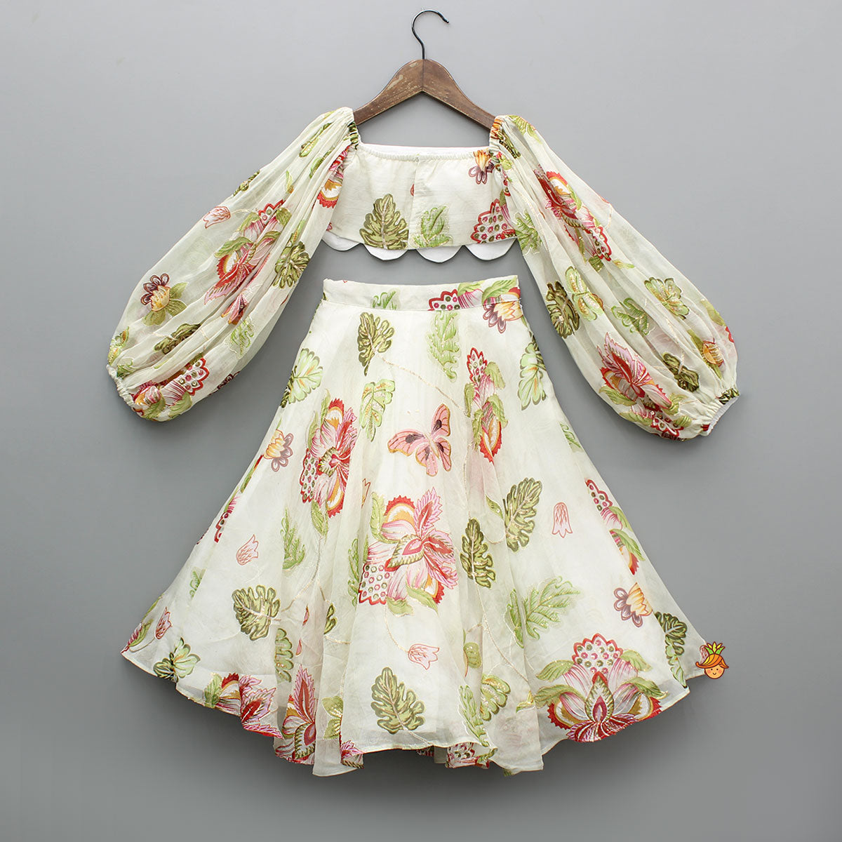 Pre Order: Beige Printed Embroidered Top And Umbrella Style Flared Lehenga With Matching Hairclip