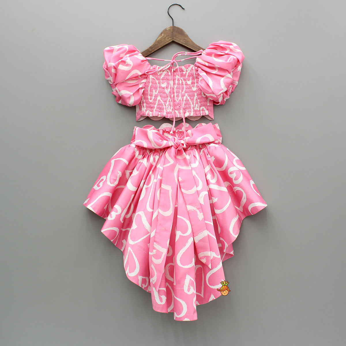 Pre Order: Pink Printed Smocked Top And High Low Skirt With Hairband
