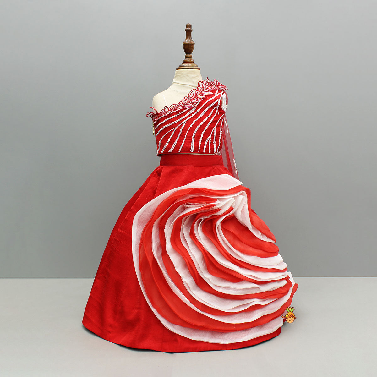 Pre Order: Red One Shoulder Embellished Top With Attached Dupatta And Stylish Lehenga