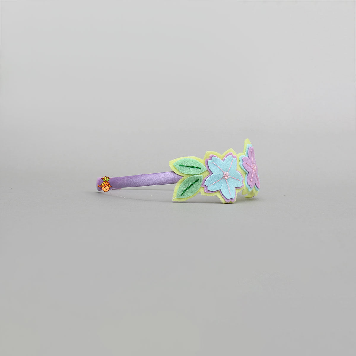 Multicoloured Artificial Flower Embellished Hairband