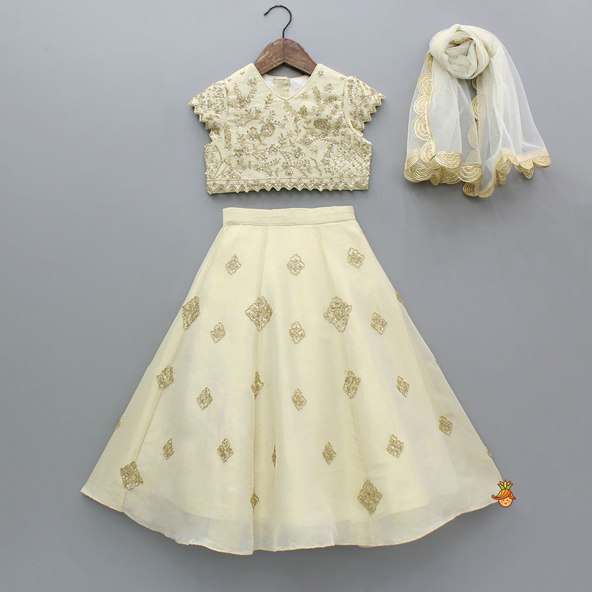 Pre Order: Beige Shimmery Sequin Embroidered Top With Flared Lehenga And Matching Dupatta