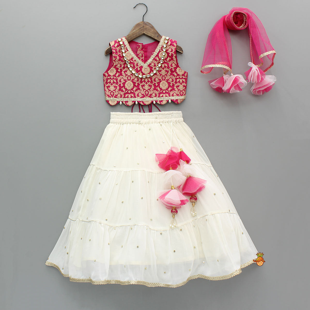Pre Order: Pink Brocade Top With Off White Lehenga And Dupatta