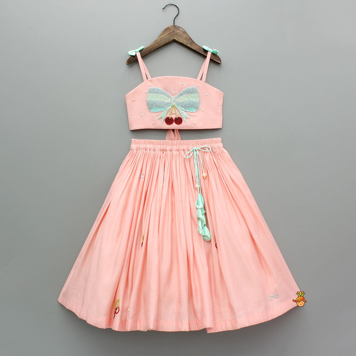 Pre Order: Peach Embroidered Silk Top With Lehenga
