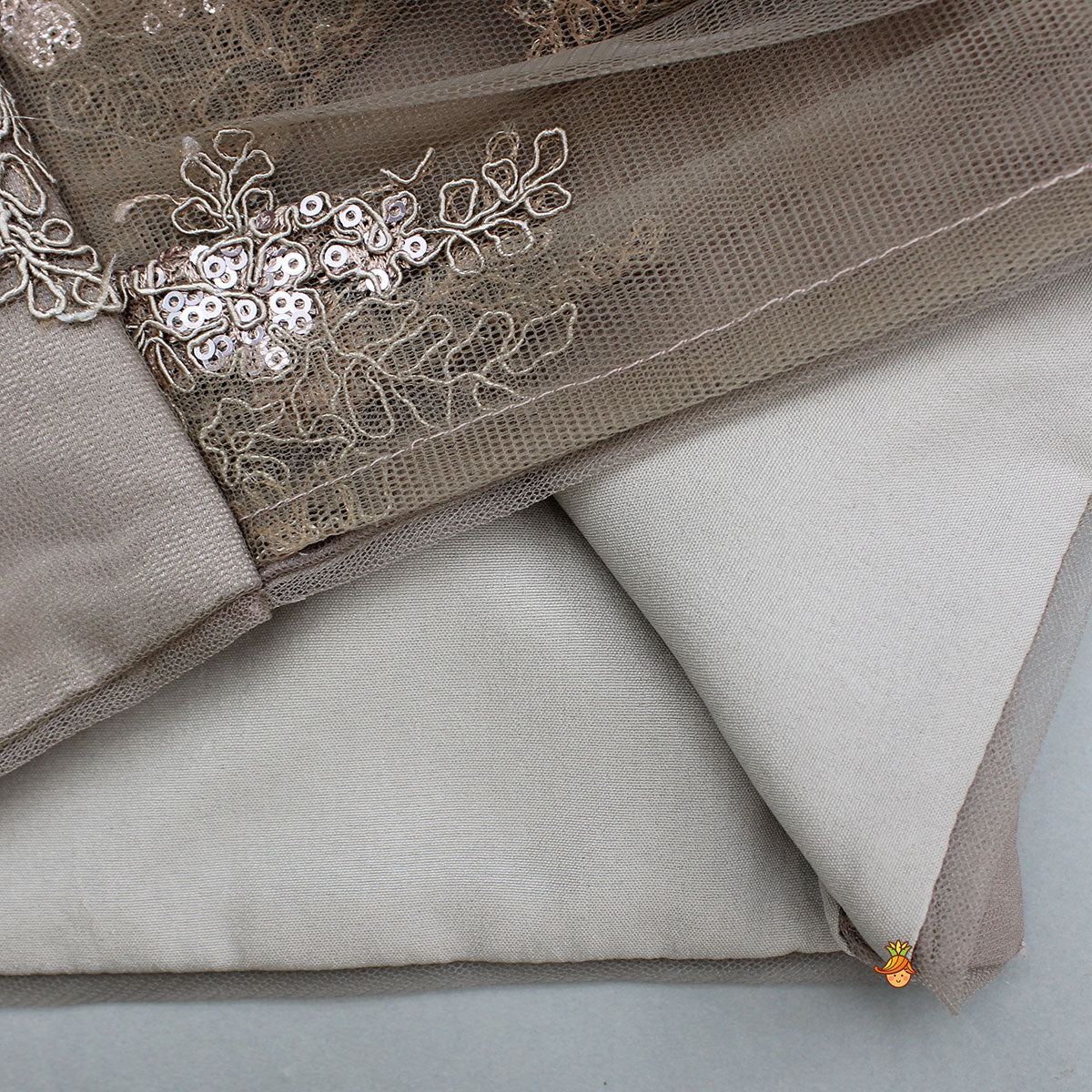 Pre Order: Exquisite Brown Embroidered One Shoulder Drape Top And Layered Lehenga