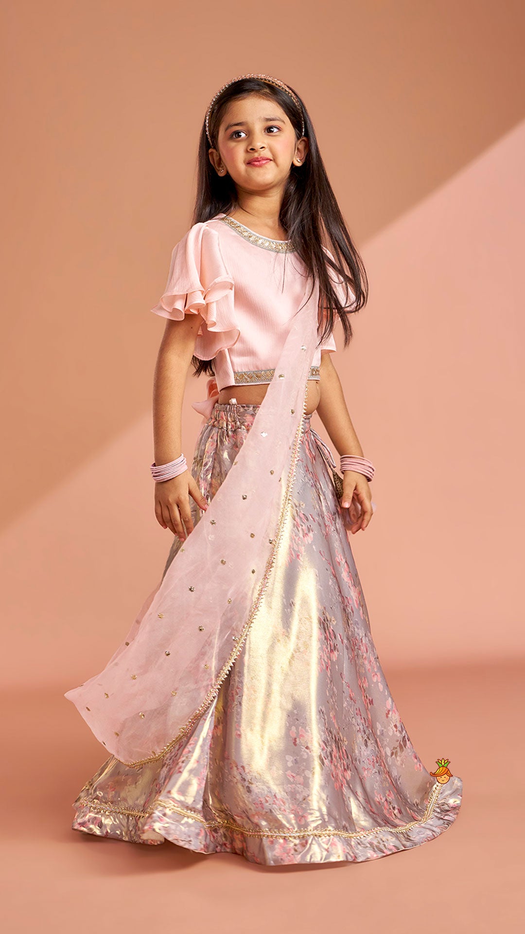 Pre Order: Peach Ruffle Sleeves Top With Shimmery Floral Lehenga And Attached Dupatta