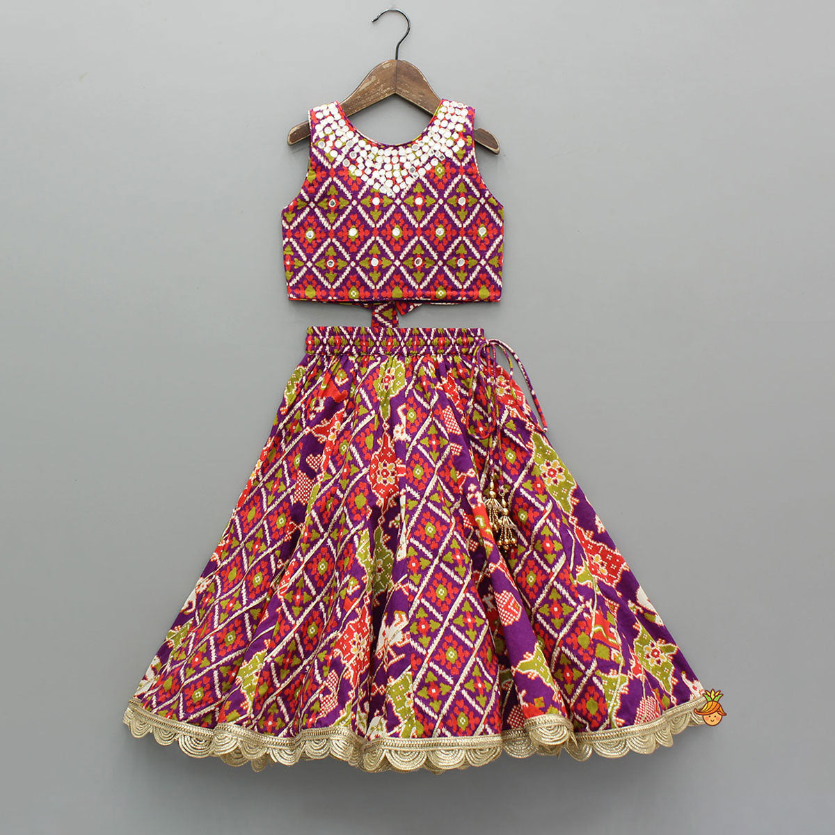 Pre Order: Ikat Printed Faux Mirror Embroidered Sleeveless Top With Lehenga