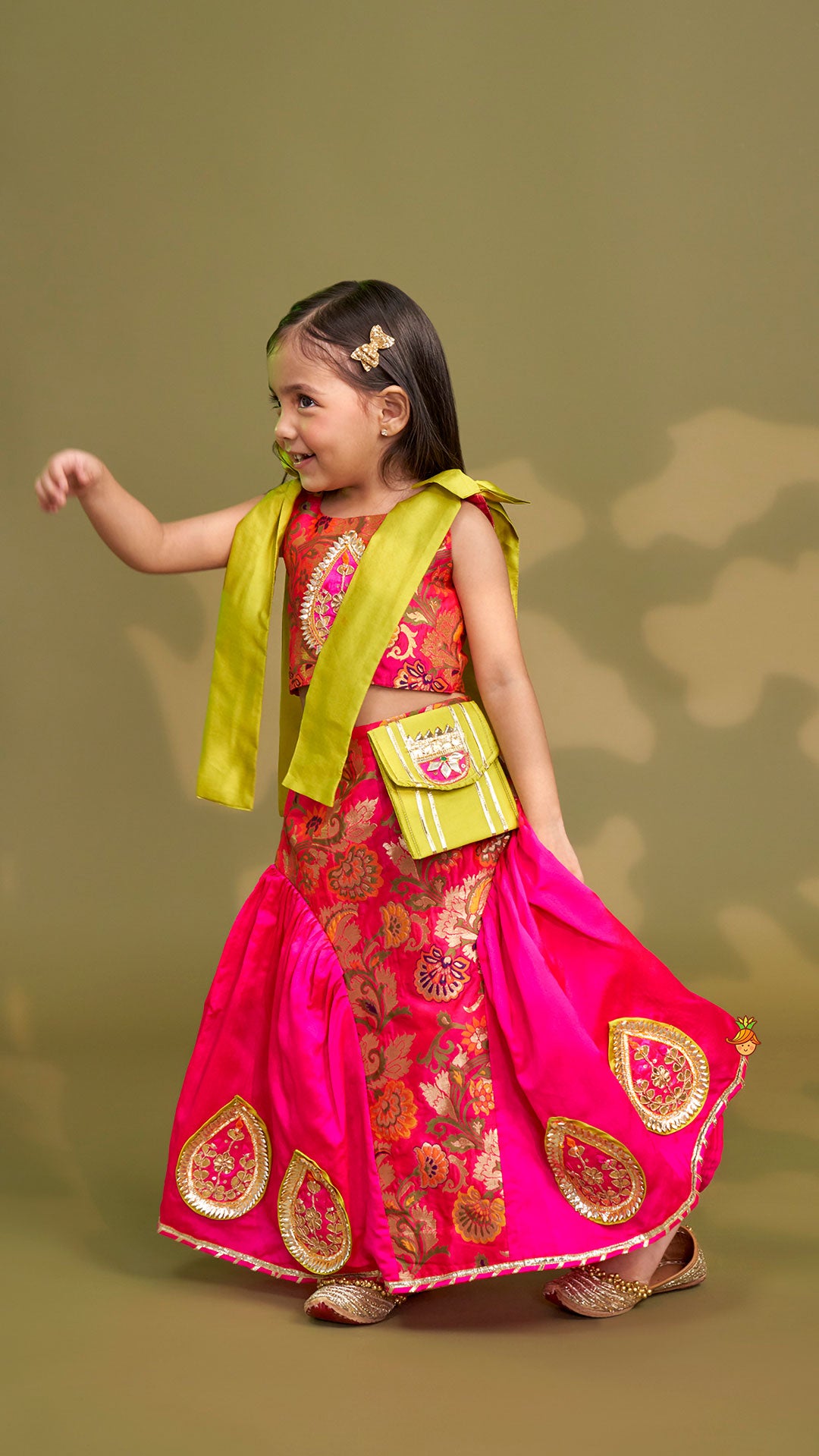 Pre Order: Stunning Bow Embellished Floral Top With Matching Lehenga And Attached Pouch