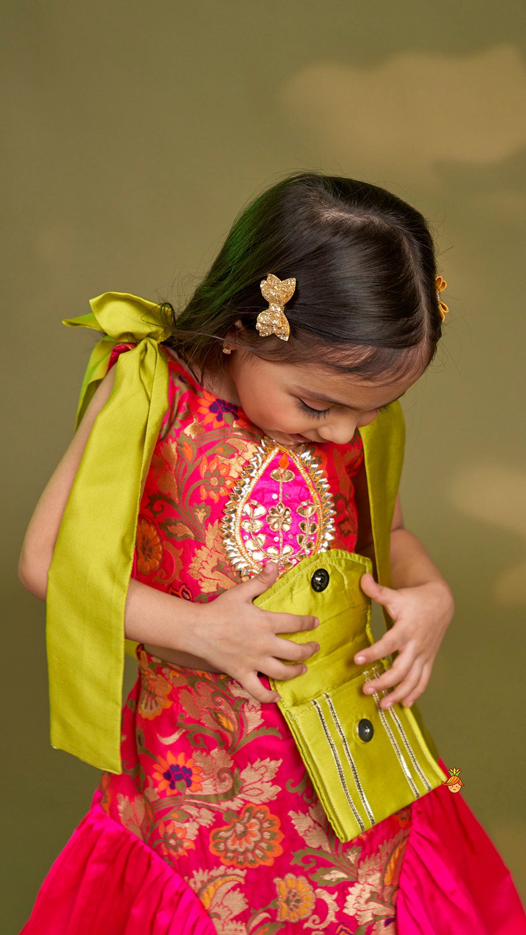 Pre Order: Stunning Bow Embellished Floral Top With Matching Lehenga And Attached Pouch
